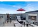 Great rooftop entertaining area with a fireplace and space for an outdoor table at 9050 W Tropicana Ave # 1009, Las Vegas, NV 89147