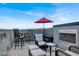 Great rooftop entertaining area with a fireplace and space for an outdoor table at 9050 W Tropicana Ave # 1009, Las Vegas, NV 89147