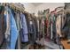 Walk-in closet featuring ample storage space and organizational racks at 1010 Armillaria St, Henderson, NV 89011