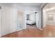 Inviting entryway boasting hardwood floors and a clear view of the bedroom at 1010 Armillaria St, Henderson, NV 89011
