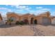 Charming single story home with well-maintained landscaping, desert-style, and a two-car garage at 1010 Armillaria St, Henderson, NV 89011