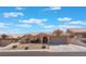 Charming single story home with well-maintained landscaping, desert-style, and a two-car garage at 1010 Armillaria St, Henderson, NV 89011