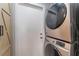 Convenient laundry area featuring stackable washer and dryer at 1010 Armillaria St, Henderson, NV 89011