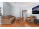 Comfortable living room featuring wood floors and neutral walls at 1010 Armillaria St, Henderson, NV 89011