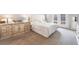 Spacious main bedroom with white walls, carpet flooring, and dresser at 1010 Armillaria St, Henderson, NV 89011