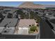 This aerial view shows the neighborhood and its proximity to the mountains at 10200 Clark Wooldridge Ct, Las Vegas, NV 89129