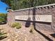 An attractive brick community sign for 'Grandview' is landscaped with greenery and stone at 10200 Clark Wooldridge Ct, Las Vegas, NV 89129