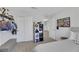 Bright bedroom featuring carpet, a closet, and whimsical decor, creating a cozy and inviting space at 1180 Solano Hills Ct, Henderson, NV 89002