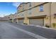 Attached garages along the street offer convenience and additional storage for residents at 1180 Solano Hills Ct, Henderson, NV 89002