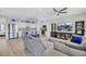 Bright, open-concept living space with modern decor and a seamless flow to the kitchen island at 1180 Solano Hills Ct, Henderson, NV 89002
