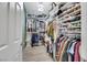 Spacious walk-in closet with custom shelving and ample storage space at 1180 Solano Hills Ct, Henderson, NV 89002