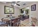 Dining area adjacent to the kitchen, featuring a table for four and modern decor at 14 Page St, Las Vegas, NV 89110