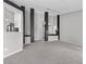Spacious living room features neutral decor, open floor plan and pillars at 1403 Bareback Ct, Henderson, NV 89014