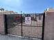 Close-up of a black metal gate with 