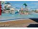 Community water park featuring an array of colorful slides and splash areas for Gathering fun at 1403 Bareback Ct, Henderson, NV 89014