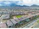 Elevated aerial view of a residential community with mountains in the distance at 154 Nine Mile Creek Dr, Las Vegas, NV 89138