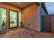 Exterior rear view of home showcasing the indoor/outdoor living space at 154 Nine Mile Creek Dr, Las Vegas, NV 89138