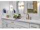 Elegant bathroom features dual sinks, quartz countertops, and modern fixtures at 154 Nine Mile Creek Dr, Las Vegas, NV 89138