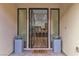 Welcoming entryway with a view of the kitchen and dining area, featuring modern decor at 154 Nine Mile Creek Dr, Las Vegas, NV 89138