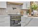 Well-equipped kitchen with stainless steel oven and range, plus modern countertops at 154 Nine Mile Creek Dr, Las Vegas, NV 89138