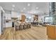 Spacious open-concept kitchen and dining area with modern appliances and ample seating at 154 Nine Mile Creek Dr, Las Vegas, NV 89138