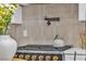 This gourmet kitchen features stainless steel appliances and a pot filler at 154 Nine Mile Creek Dr, Las Vegas, NV 89138