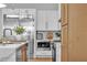 Stylish kitchen with stainless steel appliances, modern cabinetry, and marble countertops at 154 Nine Mile Creek Dr, Las Vegas, NV 89138