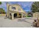 A spacious backyard with covered patio, offering a relaxing spot for gatherings and outdoor dining at 2073 Sapphire Valley Ave, Henderson, NV 89074