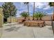 Outdoor kitchen and patio area with a built-in grill, shed, and basketball hoop at 2073 Sapphire Valley Ave, Henderson, NV 89074