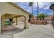 Outdoor living space with covered patio, dining area and built in grill at 2073 Sapphire Valley Ave, Henderson, NV 89074