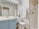 Well-maintained bathroom featuring a shower, vanity, toilet and great lighting at 2073 Sapphire Valley Ave, Henderson, NV 89074