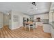 Open kitchen with white cabinets, stainless steel appliances, and butcher block island at 2073 Sapphire Valley Ave, Henderson, NV 89074