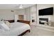 Main bedroom with fireplace and access to the luxurious ensuite bathroom at 2073 Sapphire Valley Ave, Henderson, NV 89074