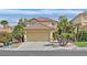Charming two-story home with red tile roof, desert landscaping and a two car garage at 2324 Babcock Dr, Las Vegas, NV 89134