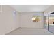 Bright bedroom with large windows and sliding glass doors with access to the pool at 24 Painted View St, Henderson, NV 89012