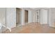 Bedroom with tile floors, white doors, and closet access at 24 Painted View St, Henderson, NV 89012