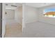 Bedroom with neutral carpet, ample natural light, and easy access to nearby bedrooms at 24 Painted View St, Henderson, NV 89012