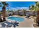 Aerial view of the home showing the pool and mature landscaping at 2685 S Tenaya Way, Las Vegas, NV 89117