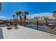 Backyard pool and patio area featuring mature landscaping and plenty of space to entertain at 2685 S Tenaya Way, Las Vegas, NV 89117