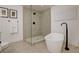 Modern bathroom featuring a new standalone tub, and tiled walk-in shower at 2685 S Tenaya Way, Las Vegas, NV 89117