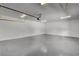 Spacious garage with ample storage space and an automatic door opener at 2685 S Tenaya Way, Las Vegas, NV 89117