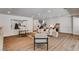 Spacious living room with hardwood floors, recessed lighting, and neutral decor at 2685 S Tenaya Way, Las Vegas, NV 89117