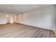 Open concept living room with hardwood floors and bright natural light at 2685 S Tenaya Way, Las Vegas, NV 89117