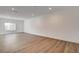 Spacious living room with wood-look floors and recessed lighting at 2685 S Tenaya Way, Las Vegas, NV 89117