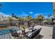 Outdoor patio area featuring a lounge area and a view of the backyard pool at 2685 S Tenaya Way, Las Vegas, NV 89117