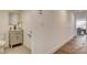 Stylish powder room with modern vanity, tiled floor, and neutral paint at 2685 S Tenaya Way, Las Vegas, NV 89117