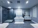 A luxurious bathroom featuring a modern tub, sleek shower, and elegant vanity with double sinks and a large mirror at 270 Shaded Canyon Dr, Henderson, NV 89012
