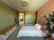 bedroom featuring fun accent wall, bed, and playful decor at 270 Shaded Canyon Dr, Henderson, NV 89012