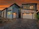 Contemporary two-story home showcasing clean lines and stone accents at 270 Shaded Canyon Dr, Henderson, NV 89012