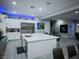 Kitchen area featuring a large center island with bar seating and stainless steel appliances at 270 Shaded Canyon Dr, Henderson, NV 89012